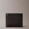 Cartera plegable con Monogram en relieve en toda la superficie y bolsillo para monedas Cartera plegable con Monogram en relieve en toda la superficie y bolsillo para monedas