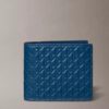Cartera plegable con Monogram en relieve en toda la superficie y bolsillo para monedas Cartera plegable con Monogram en relieve en toda la superficie y bolsillo para monedas