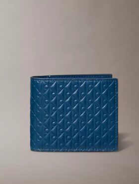 Cartera plegable con Monogram en relieve en toda la superficie y bolsillo para monedas