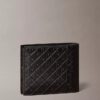 Cartera plegable con Monogram en relieve en toda la superficie y bolsillo para monedas Cartera plegable con Monogram en relieve en toda la superficie y bolsillo para monedas