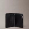 Cartera plegable con Monogram en relieve y monedero Cartera plegable con Monogram en relieve y monedero