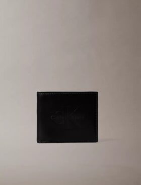 Cartera plegable con relieve Monólogo