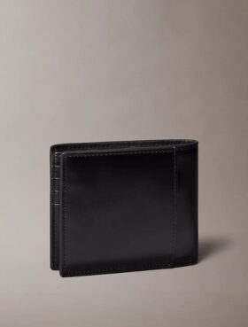 Cartera plegable con relieve Monólogo