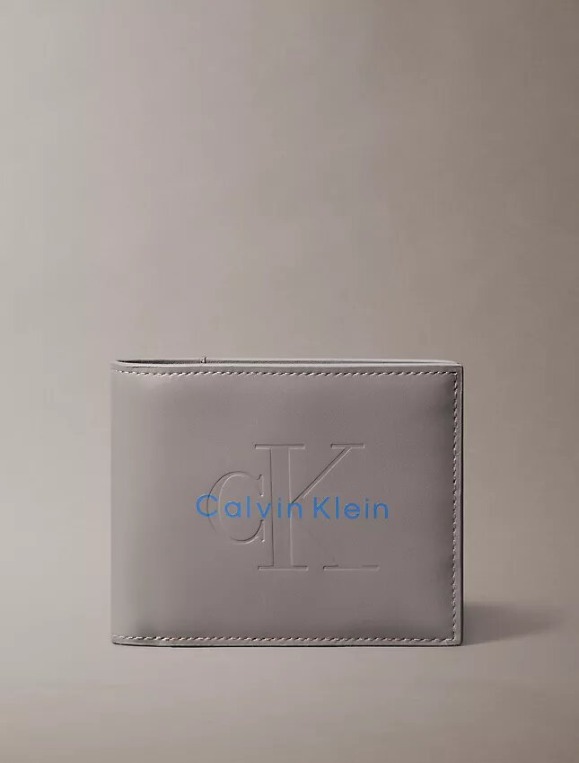 Cartera plegable Monólogo con relieve y monedero Cartera plegable Monólogo con relieve y monedero