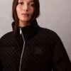 Chaqueta acolchada con monograma integral Chaqueta acolchada con monograma integral