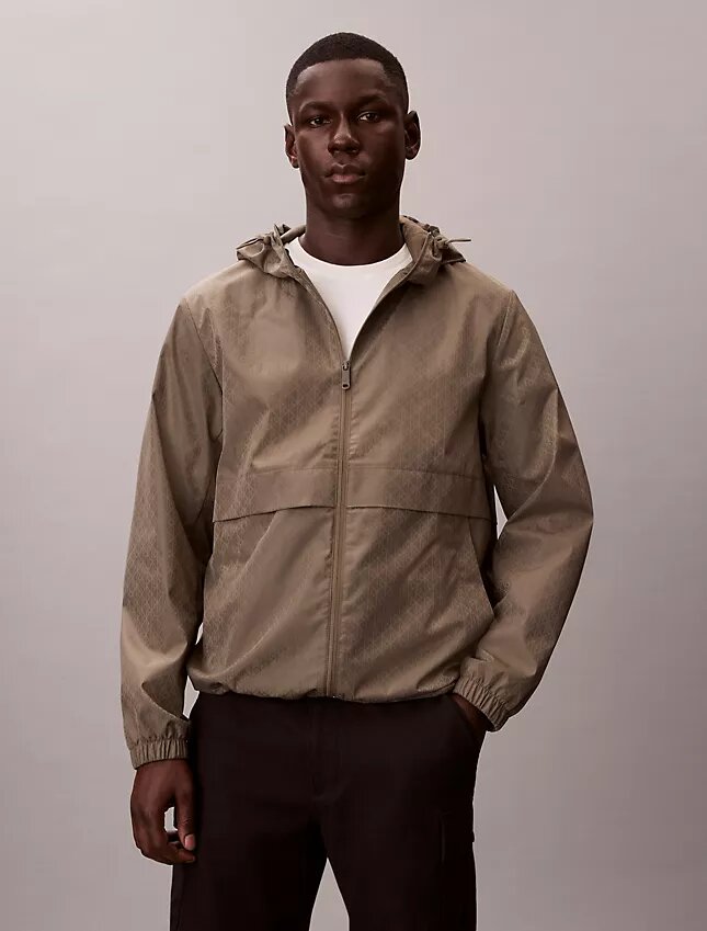 Chaqueta cortavientos con logotipo en todo el tejido Chaqueta cortavientos con logotipo en todo el tejido