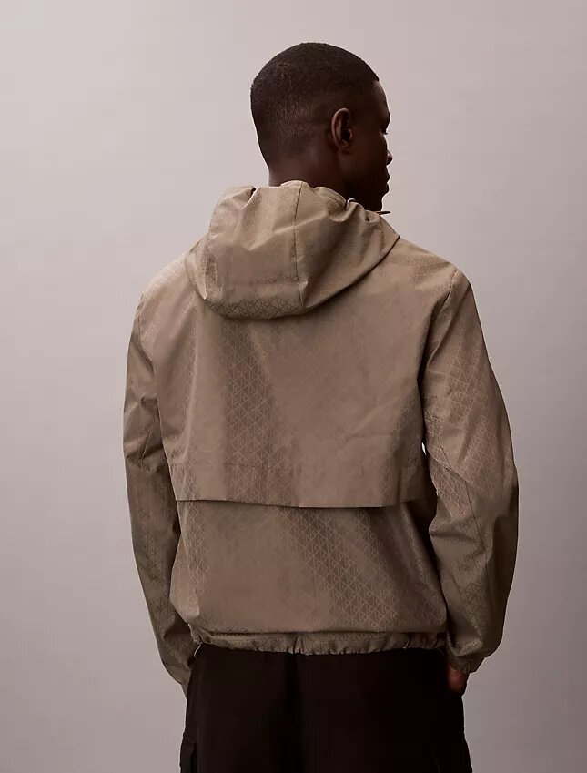 Chaqueta cortavientos con logotipo en todo el tejido Chaqueta cortavientos con logotipo en todo el tejido