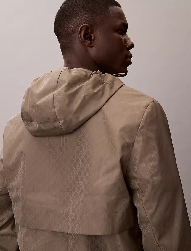 Chaqueta cortavientos con logotipo en todo el tejido Chaqueta cortavientos con logotipo en todo el tejido