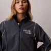 Chaqueta ligera con gráfico del logotipo de 1989