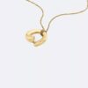 Collar con colgante redondo escultural