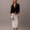 Falda midi estampada de satén arrugado