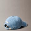 Gorra de béisbol con logotipo emblemático en Denim