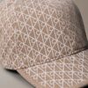 Gorra de béisbol con logotipo estampado por toda la superficie