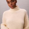 Jersey de cuello alto holgado con canalé