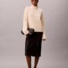 Jersey de cuello alto holgado con canalé