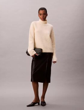 Jersey de cuello alto holgado con canalé