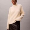 Jersey de cuello alto holgado con canalé
