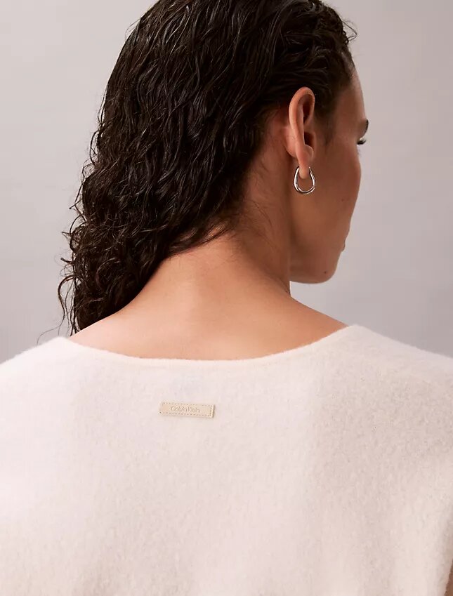 Jersey holgado de cuello en V de lana merina Jersey holgado de cuello en V de lana merina