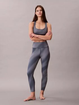 Leggings de talle alto y corte 7/8 con estampado deportivo moderno