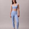 Leggings deportivos modernos de talle alto con logo en la cintura y corte 7/8