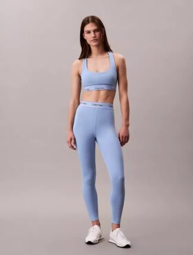 Leggings deportivos modernos de talle alto con logo en la cintura y corte 7/8