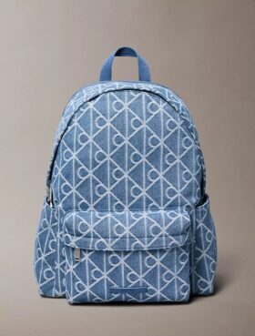 Mochila con logotipo y emblema integral en Denim