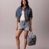 Mochila mini con solapa de Denim y logotipo Mochila mini con solapa de Denim y logotipo