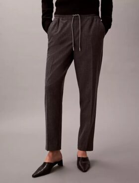Pantalones ajustados a la tobillera con rayas y cordón
