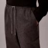 Pantalones ajustados a la tobillera con rayas y cordón