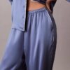 Pantalones con brillo satinado