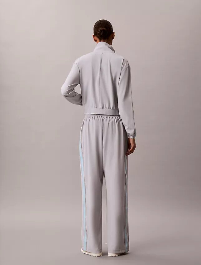 Pantalones con cinta con el logotipo de Commuter Pantalones con cinta con el logotipo de Commuter