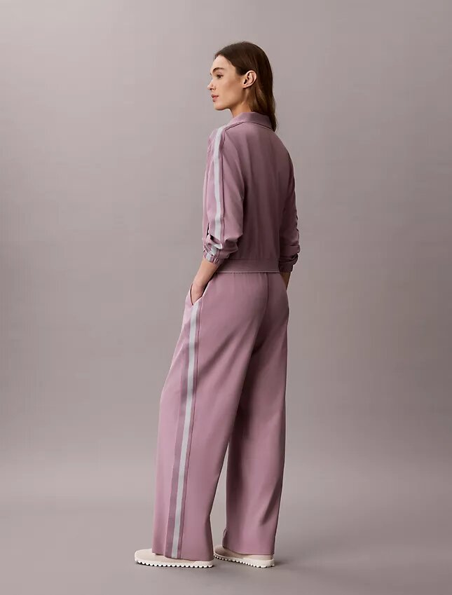 Pantalones con cinta con el logotipo de Commuter Pantalones con cinta con el logotipo de Commuter