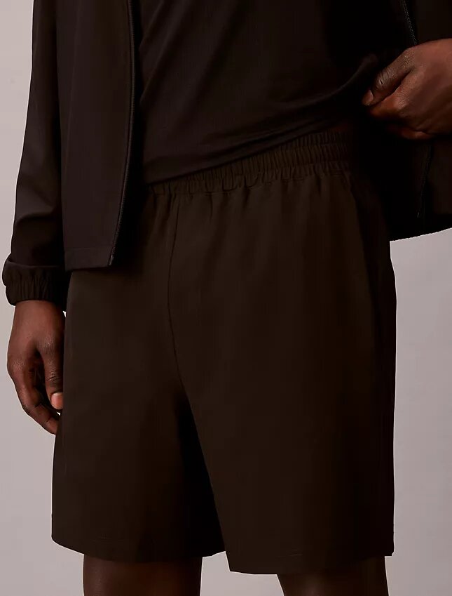 Pantalones cortos con monograma estampado Pantalones cortos con monograma estampado
