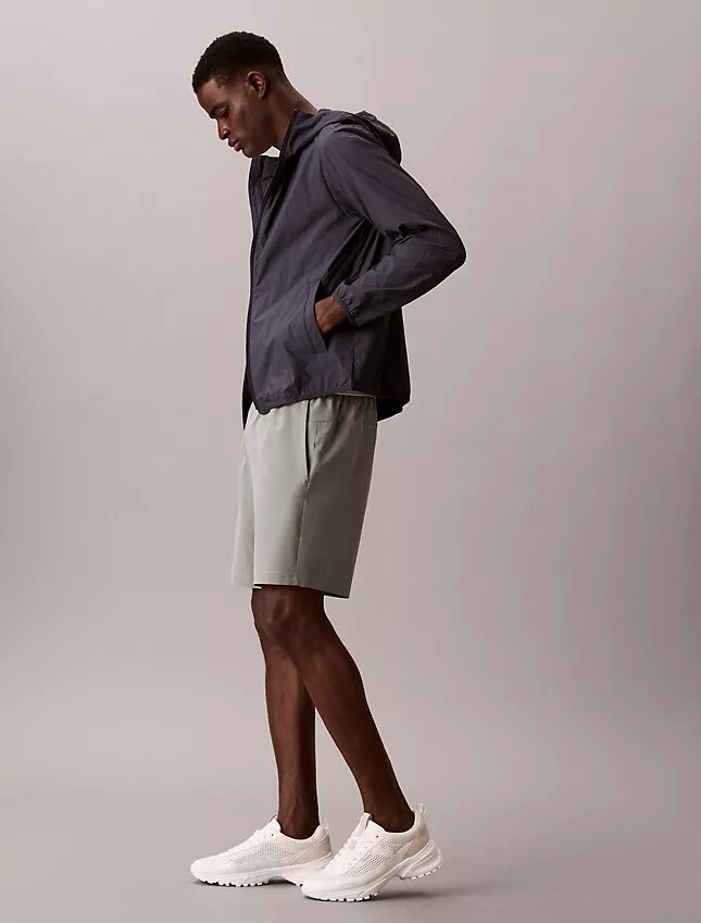 Pantalones cortos con monograma estampado Pantalones cortos con monograma estampado
