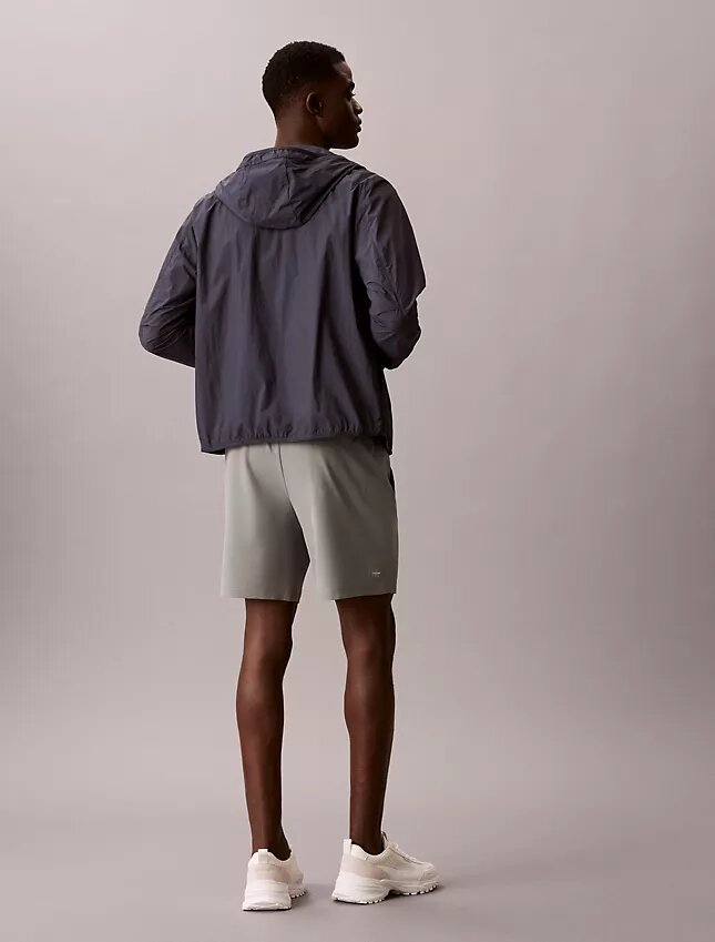 Pantalones cortos con monograma estampado Pantalones cortos con monograma estampado