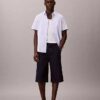 Pantalones cortos largos de Denim índigo ligero Pantalones cortos largos de Denim índigo ligero