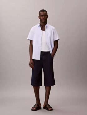 Pantalones cortos largos de Denim índigo ligero