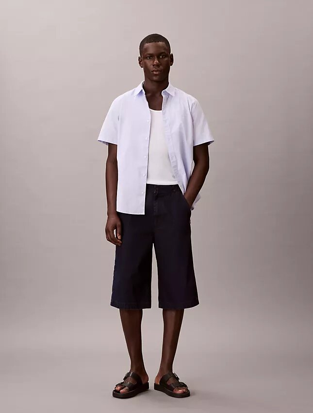 Pantalones cortos largos de Denim índigo ligero Pantalones cortos largos de Denim índigo ligero
