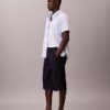 Pantalones cortos largos de Denim índigo ligero Pantalones cortos largos de Denim índigo ligero