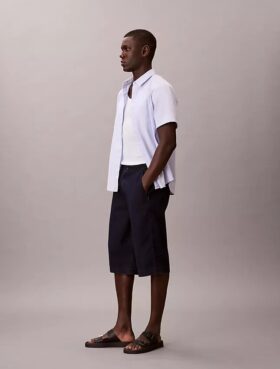Pantalones cortos largos de Denim índigo ligero