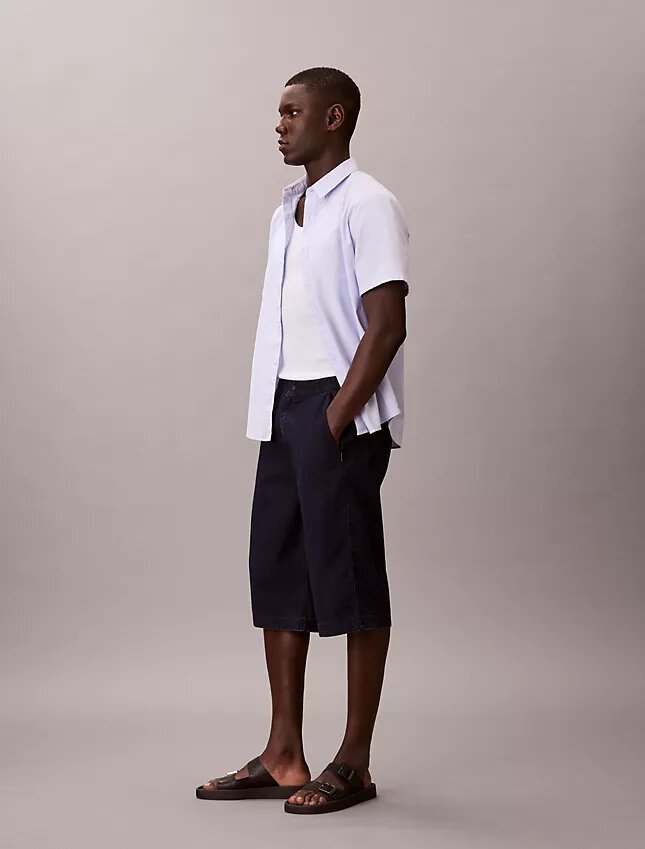 Pantalones cortos largos de Denim índigo ligero Pantalones cortos largos de Denim índigo ligero