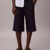 Pantalones cortos largos de Denim índigo ligero Pantalones cortos largos de Denim índigo ligero