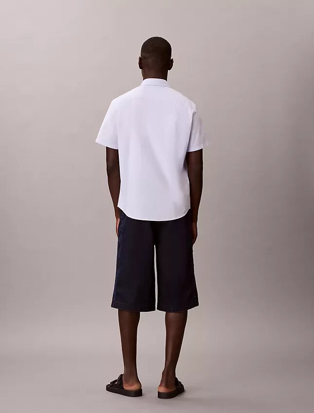 Pantalones cortos largos de Denim índigo ligero Pantalones cortos largos de Denim índigo ligero