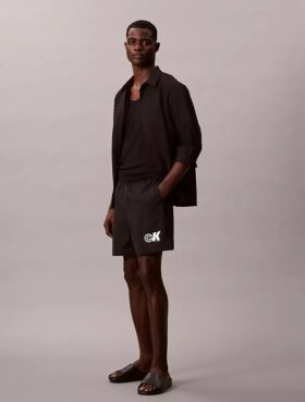 Pantalones cortos sin cremallera con gráfico de Monogram