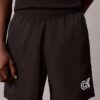 Pantalones cortos sin cremallera con gráfico de Monogram