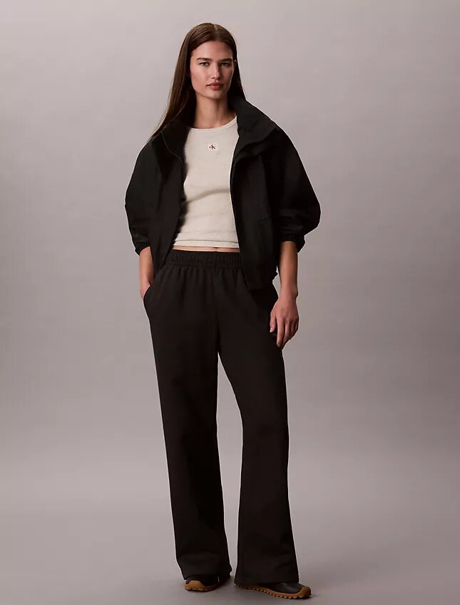 Pantalones de chándal de felpa de pierna ancha con monólogo Pantalones de chándal de felpa de pierna ancha con monólogo