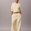 Pantalones de chándal de felpa de pierna ancha con monólogo Pantalones de chándal de felpa de pierna ancha con monólogo