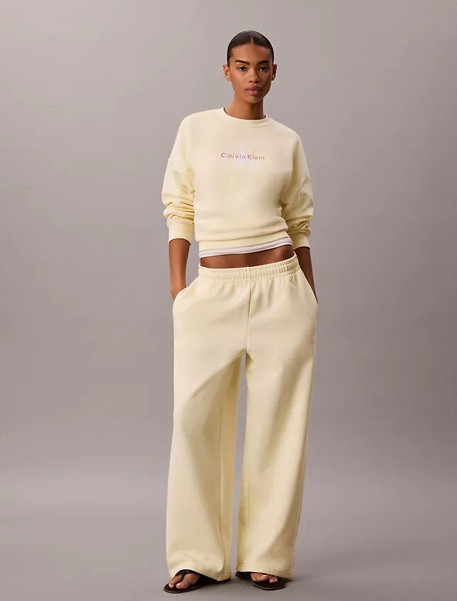 Pantalones de chándal de felpa de pierna ancha con monólogo Pantalones de chándal de felpa de pierna ancha con monólogo