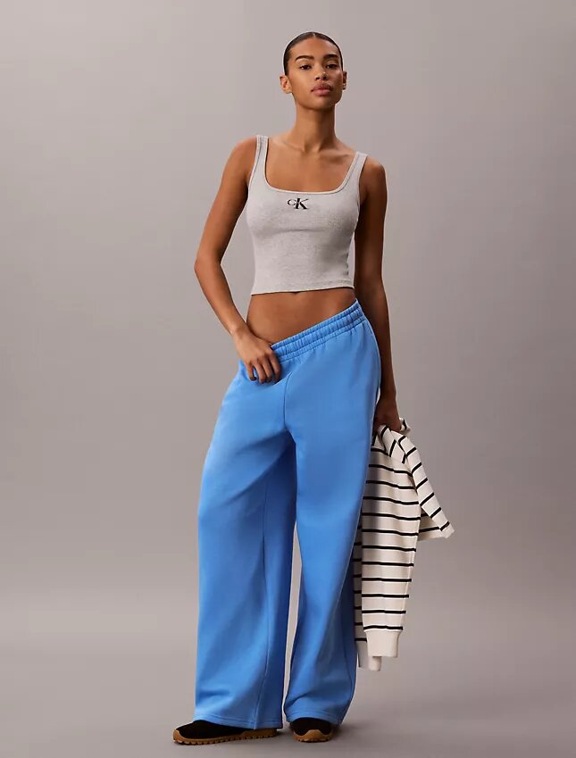 Pantalones de chándal de felpa de pierna ancha con monólogo Pantalones de chándal de felpa de pierna ancha con monólogo