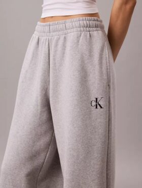 Pantalones de chándal de felpa de pierna ancha con monólogo